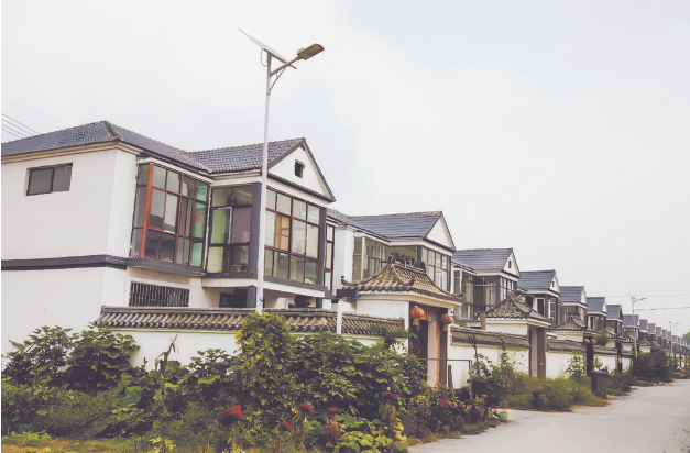 建設(shè)現(xiàn)代宜居農(nóng)房，提升農(nóng)民居住水平