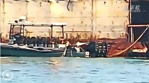 菲律賓非法“坐灘”軍艦人員 破壞中國漁民所放漁網(wǎng)